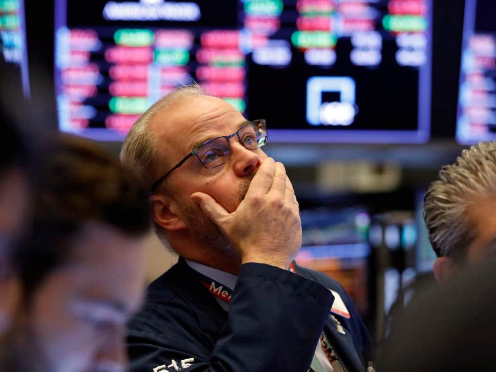 After early gains, Wall Street plunged on Tuesday after a coronavirus warning unnerved markets. AP